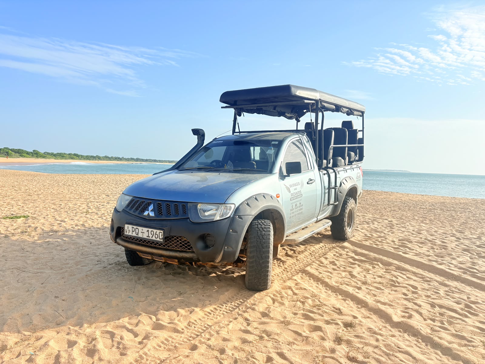 Modified 4x4 safari jeep with elevated 360-degree viewing seats in Kumana